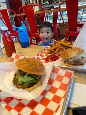 He loves these juicy burgers