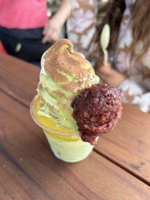 matcha vanilla swirl with red bean and mango puree and cocoa dust