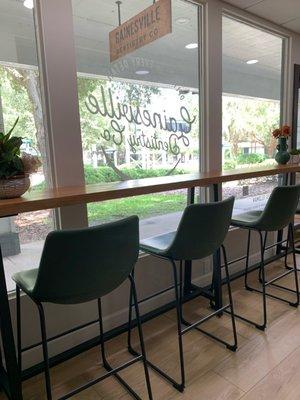 Enjoy a coffee or water at our bar height table and take in the quaint views of the Shoppes at Thornebrook while you're in our office!