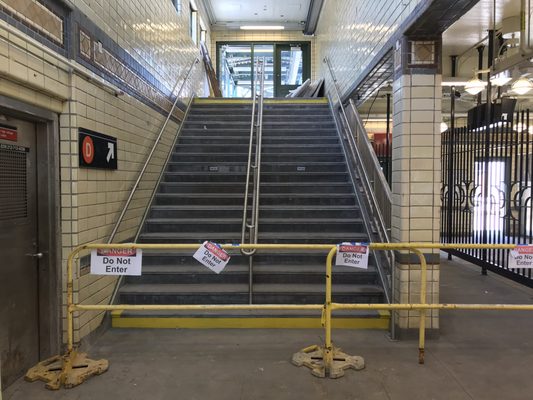 Ongoing renovations to the D Train platform.