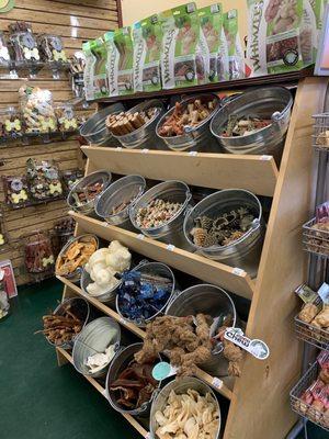 Bins of treats! Careful with the snout-level ones if you're shopping with your pup!