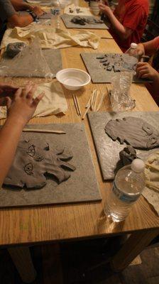 We offer classes in varies types of medium such as ceramics, clay, canvas, and wood sign painting.