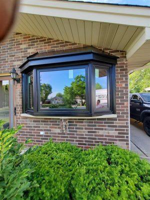 Black Bay Window installation, energy efficient triple pane glass