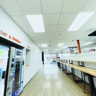 It's nice to see the finished product on this project. We installed Armstrong's 2x2 Ultima Drop Ceiling Grid and Tiles for this Laundromat.