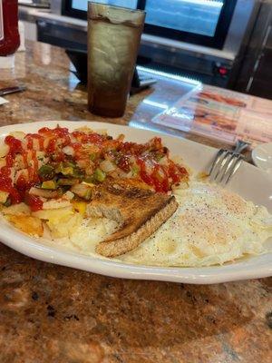 Eggs over easy, rye toast, and home fries!