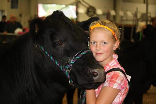 Our youngest Daughter Tori and her Steer.