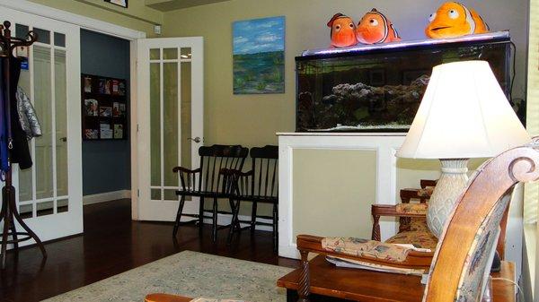 Our waiting room with a beautiful salt water fish tank where you can find Nemo and all his friends!