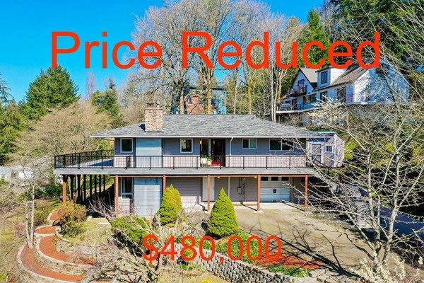 Welcome to this updated & meticulously maintained home on Phinney Bay. Take joy in the Mountain & Water views from the wrap around trek deck