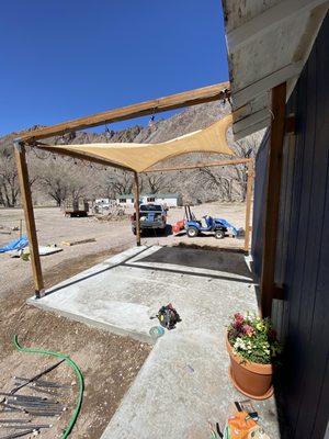 Concrete patio with cover.