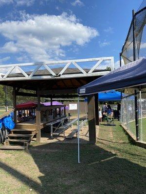 Covered gazebos at each field