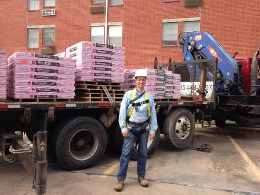 Helping Apartment Residents Chill Out Under A White Cool Roof, A Truckload Of Owens-Corning ENERGY STAR Certified Asphalt Roofing Shingles.