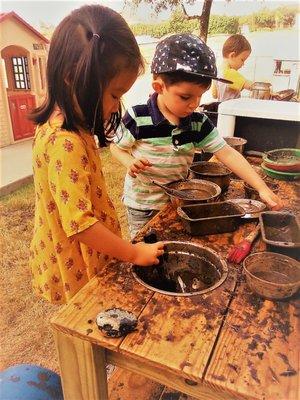 More mud kitchen play!