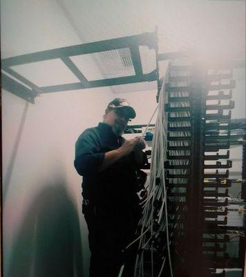 Technician working on Network cabling