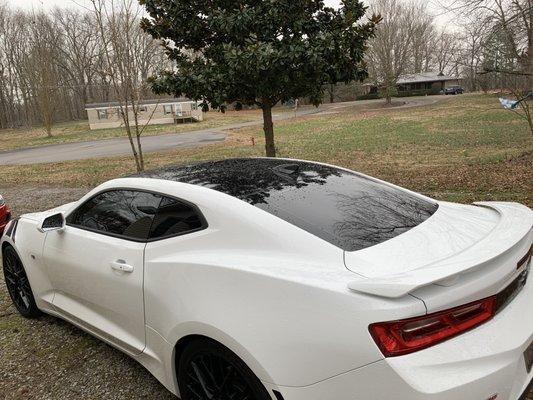 Gloss black vinyl roof wrap and rear deck lid strip