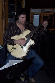 Bob Wolfman in studio recording his latest CD "TRANSITION" ©2012, playing a custom made Ken Parker guitar.