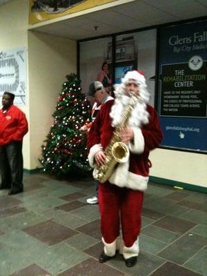 Sax Santa blowing cool Christmas songs.