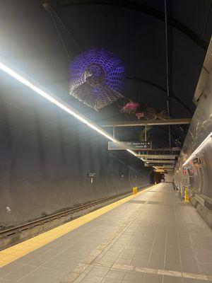 Art hanging from the platform going northbound