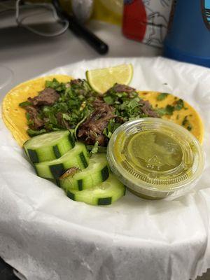 A roach and tacos de lengua