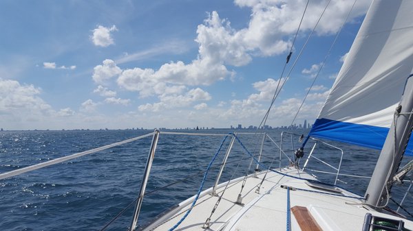 Sailing in Chicago with the skyline far in the distance.