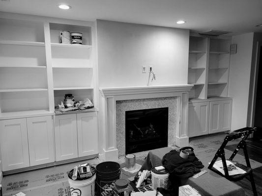 built in cabinets, custom shelves and mantle. (in progress)