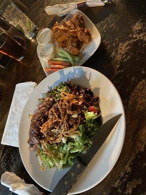 Buffalo wings and the steak salad