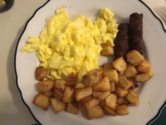 Hospital quality eggs and burnt sausage