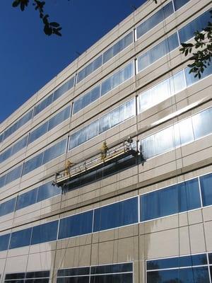 Pressure washing from a stage