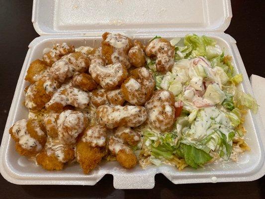 Shrimp over rice w/ salad and white sauce