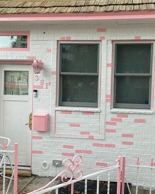 Cute Pink and white brick house i painted