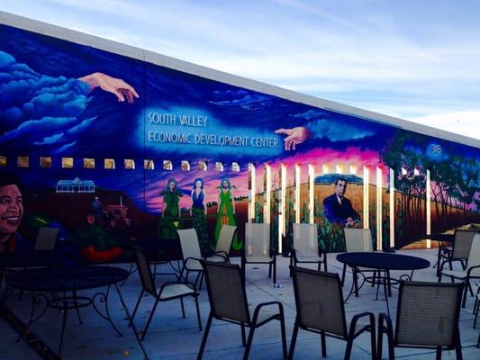 Beautiful mural and patio as you walk in