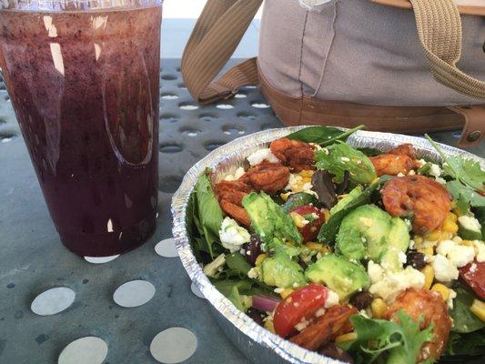 "Purple Haze" juice freshly squeezed to order. And the shrimp taco salad with feta and vinegrette on the side. Delicious  Fresh. Healthy.