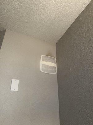 Dirt/mold build up above vent in bathroom