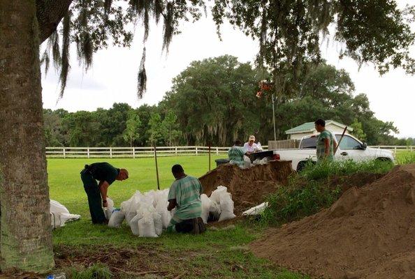 Sheriff's adept. & inmates working hard to keep the county's residents safe from storms-2016