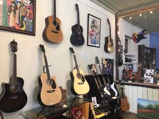 Guitarpalooza! A variety of guitars and other musical instruments and accessories are for sale at the gallery.