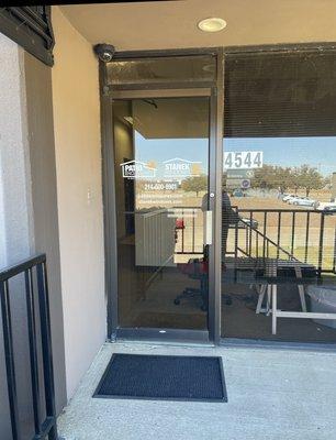 Patio Enclosures office door at 4544 Sunbelt Dr in Addison.