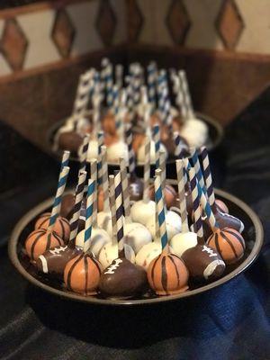 Basketball and baseball and football cake pops