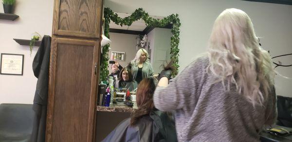 Sharon Bowman getting her hair done.