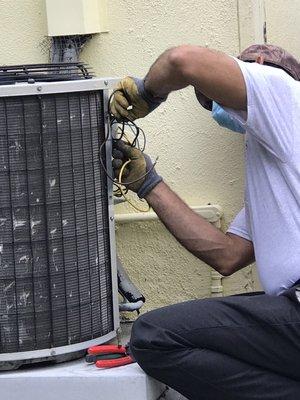 Roger repairing AC