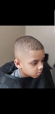 Wave length on top, high skin fade with lineup.