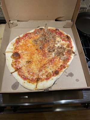 Pizza with supposedly half sausage