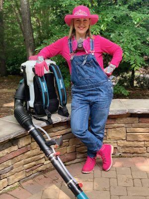 The Queen Bee in her pink hat and crown, ready to treat your yard for mosquitoes, fleas and ticks!