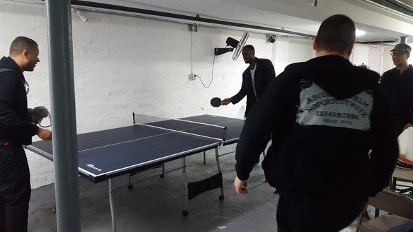 Downstairs features ping pong, tables to eat on and has an AV system so you don't miss being called for a tournament.