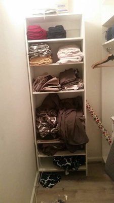 This is  a messy linen closet.