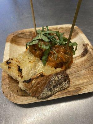 Classic veal and beef meatballs, roasted tomato sauce, grilled bread