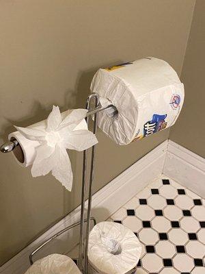 Latin's flower design on the toilet paper roll in our customers bathroom!