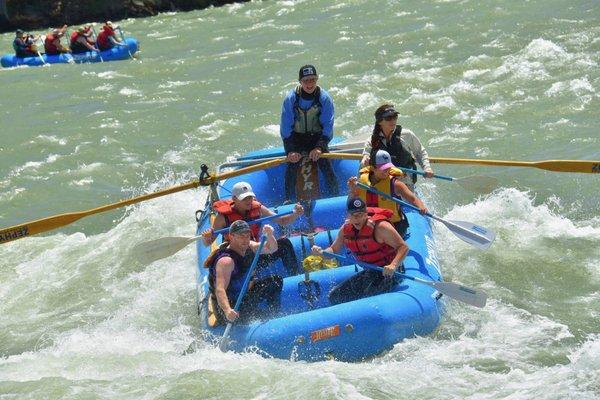 Tessa taking a team thru Mojo's Rapids