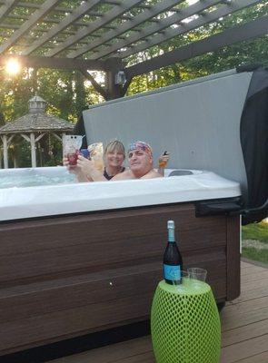 Cheers!  We love our new hot tub!