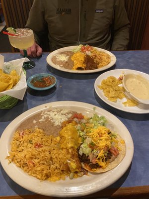 Pick two- tostada and enchilada! Behind is also a pick two with a burrito and tamales.