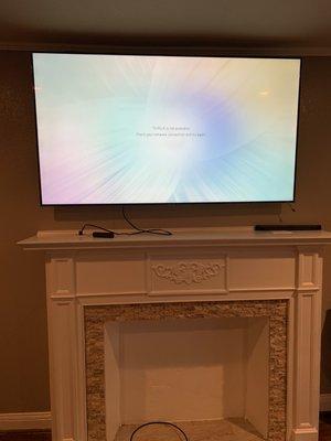 Tv mount over fireplace