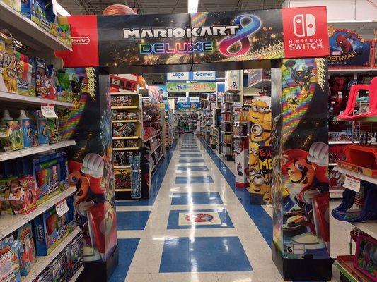 A display of Mario Kart 8 Deluxe, with the classic Toys"R"Us flooring below. Taken on June 27, 2017.